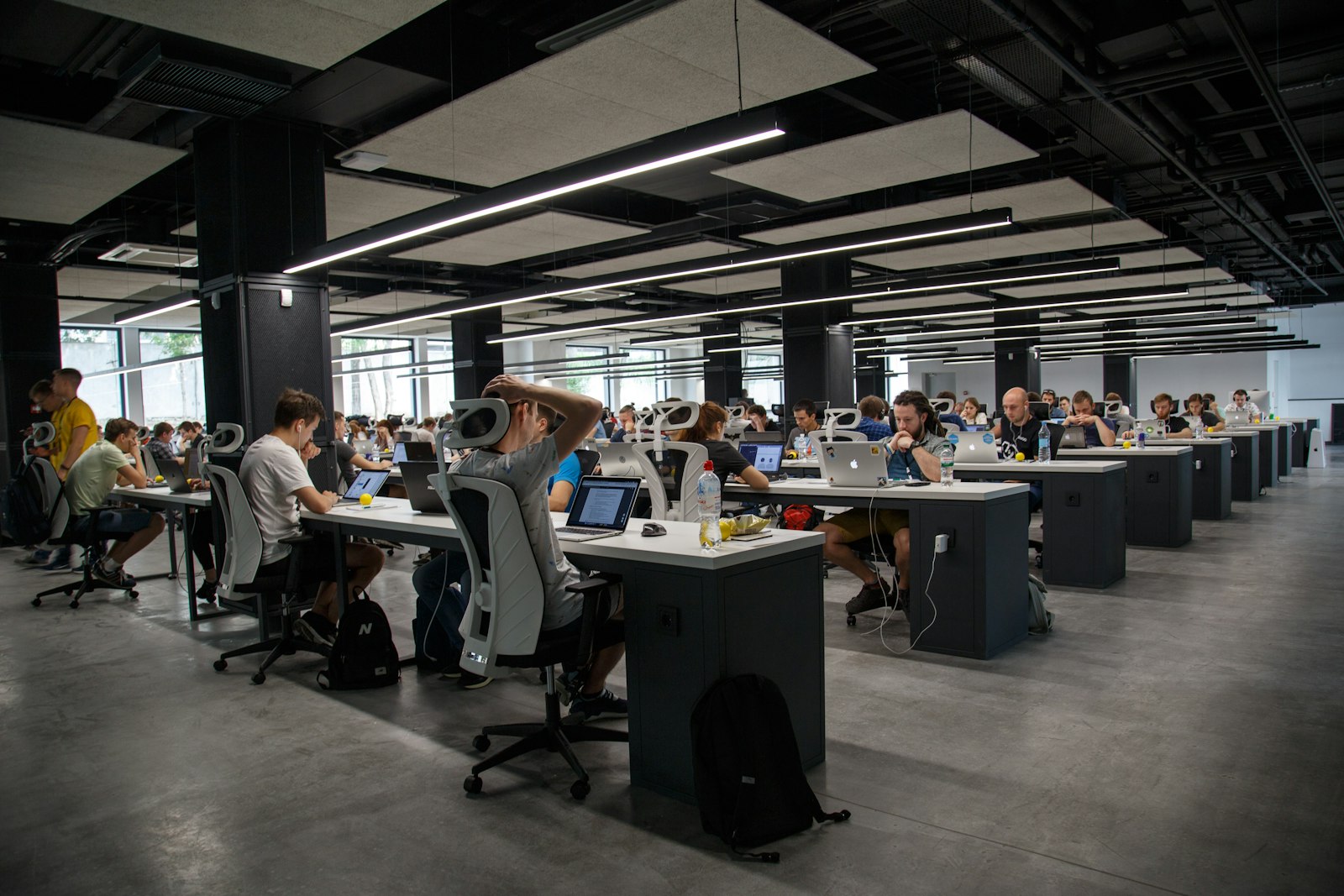 Global modern technology operations center with data visualizations